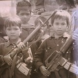 Chilid Soldiers  Picture of child soldiers at the Tuol Sleng museum. Pol Pots army consisted to a large amount of children and young adults.
