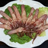 China Food Experience: Duck Tongues  Ordered by mistake when putting together a hot pot order, and fascinated by the looks of them: these are duck tongues... the taste isn't too bad really, but the whole thing mainly consists of gristle and there's not much to eat.