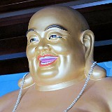 China's Laughing Buddha  The "chinese buddha" is always depicted fat and laughing - his smile representing contentment, and his obeseness for generosity. I also had to learn that he actually is not the chinese version of Buddha, but of a chinese follkloric deity named "Budai" (eventhough this is also closely related to chinese buddhism)