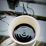 Beat of the Boat  It looks as if the coffee was beating to the music of my iPod! In fact, it is just moving to the boat's vibrations...