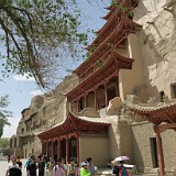 Mogao Caves  One of the major tourist attractions on the silk road are the Mogao caves - hundreds of rock grottoes carved by hand and decorated with artful paintings more than 2000 years ago. While from the inside the caves are impressive, from the outside the site lacks some character, as in order to protect them, the caves have been sealed with walls of ugly concrete...