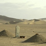 Desert Tombs  Besides the Mogao caves, Dunhuang is famous for its sand dunes. When taking a camel ride to the dunes, we passed a huge cemetery with desert graves...