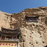 IMG 6575  Mogao may have the most elaborately painted buddhist caves on the silk road, but the ones in Mati Si are certainly the ones with the most specacular setting, and also the most adventurous ones. The caves can only be reached by a system of narrow tunnels and staircases carved inside the rock wall, and with plenty of tourists moving both ways, this is certainly nothing for the claustrophopic!