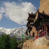 IMG 6587  Thousand buddha caves in Mati Si, backed by the beautiful snow mountains of the Qilian mountain range.