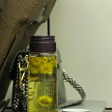 Quintessentially Chinese  Just a scene in the train, but so typically chinese as virtually EVERY chinese (a) carries along a flask with tea and (b) nibbles sun flower seeds. The shells of the sseds are disposed on the floor, by the way, no matter where you are...