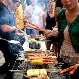Chinese Barbecue  Omeida does a lot of school activites with the main goal to mix western students learning Chinese with chinese students learning English. This night was barbecue, which seems to be popular all over china. Whatever you want to eat, just put it on a stick and grill it...