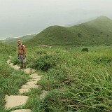 On The Way To Sunset Peak  I didn't spend much time in the city this time, but preferred to go out to the outlying islands, for instance to hike the sunset peak. The flora doesn't look very tropical, but the climate was very much so - hot and humid, i.e. very sweaty... On the picture is an Christoph, an old friend from back home, who is now living in Hongkong.