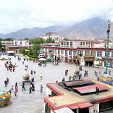 View from Jokhang Temple towards Potala  The Jokhang Temple in the heart of Lhasa is also the spiritual heart of Tibet, attracting endless numbers of pilgrims which visit the temple and do the Kora around it. In the back, the Potala palace can be seen. Besides the area around the temple and the Potala palace, Lhasa is just as ugly and characterless as any other chinese city.