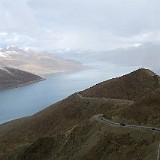 Yamdrok-tso Lake  After some morning rain, the clouds are clearing up over Yamdrok-tso Lake, one of the four holy lakes in Tibet.
