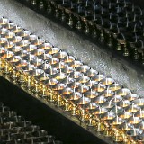 Butter Lamps in Jokhang Temple (Lhasa)  Butterlamps are a conspicious feature of Tibetan buddhist temples and symbolize the illumination of wisdom as well as the transition from a substance into illumination (i.e. enlightment). Futhermore, they help to focus the  mind and therefore aid meditation.