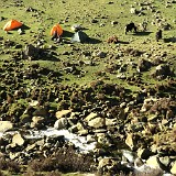Campsite  Our campsite - with our tents, our guide, our yaks and the river... basically all you need. Some warm sleeping bags would have been appreciated, too, but sleeping in full clothing, including down jacket and rain trousers was almost just as good :-)