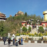 World's Largest Prayer Wheel  As we already know from the name change from Zhongdian to Shangri-La, the city government likes drastic measures for marketing. The worlds largest prayer wheel is just another example - according to our tibetan buddhist tour guide, prayer wheels traditionally exist in three sizes, the largest one havin a height of about a meter. This one has been built solely as a touris attraction. It's still quite impressive, isn't it?