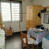 My Home for 4 Weeks  These 14 m2 have been my home for 4 weeks in Kunming. Simple, functional and not too chinese. Plus - being on 15th floow - with an impressive view of the city.