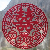 Wishing for the Best  A typical sight all over china. Chinese are very superstitious and place symbols of good luck anywhere, often as stickers on window.