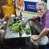 Food Experiments Company  My companions on the food tour: Thoai, the local who knows every streed kitchen of Can Tho, and Chris, an american living in Guangzhou.