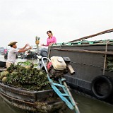 Cargo Handling at Floating Market  Pineapples change their owner and will be shipped to smaller local markets from here...