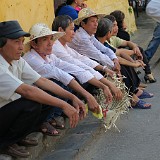 No Chair - No Problem!  This is one of the big misteries of Asia to the western tourist: how can one sit in this position for more than just a few seconds? These guys do it for hours and even swear that it is comfortable for them!