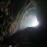 Caving to the Other Side  Caving through a narrower part of Hang En to the "back entrance"...